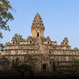 Bakong, the stepped sandstone temple-mountain, against a blue sky