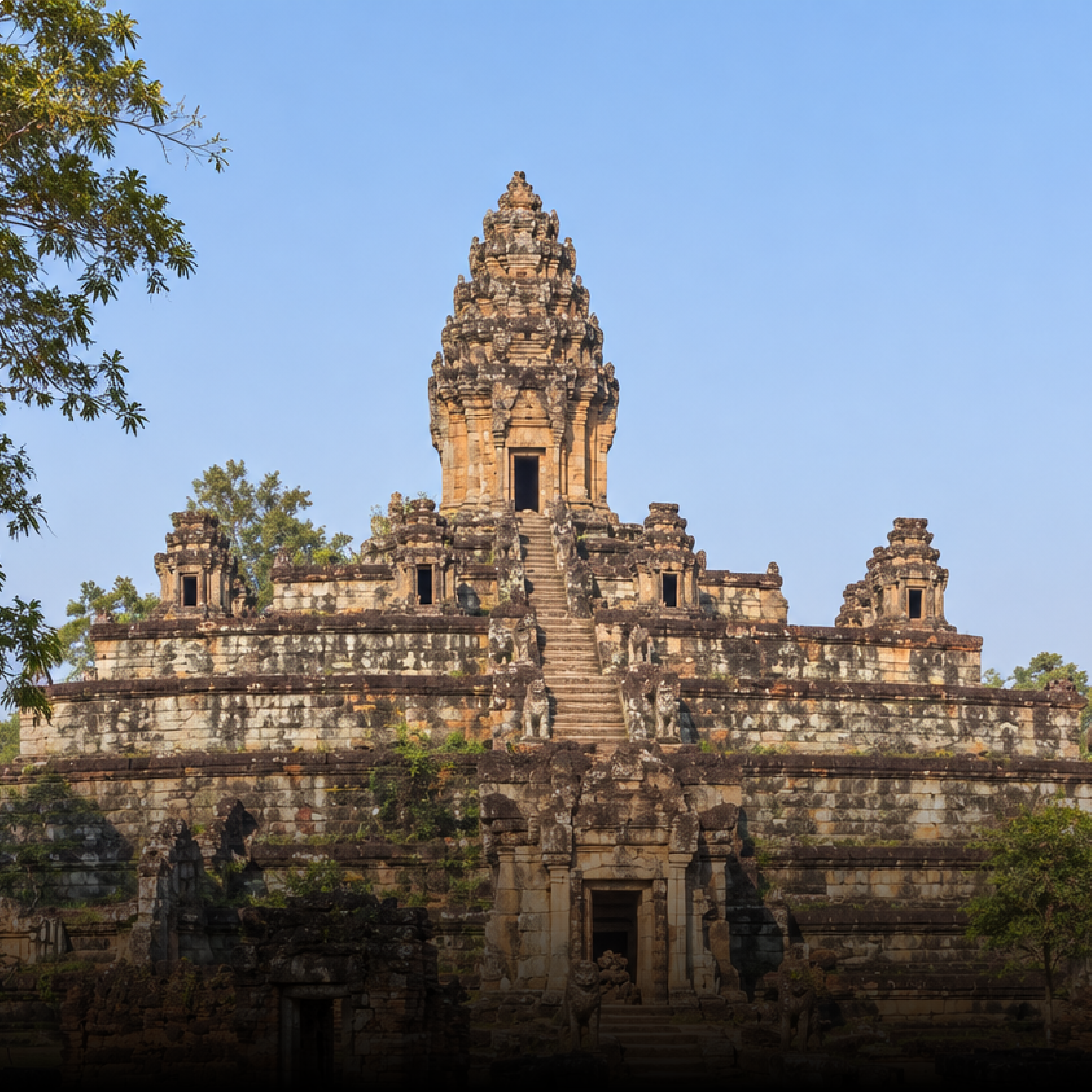 Bakong, the stepped sandstone temple-mountain, against a blue sky
